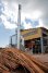 La centrale biomasse de Kourou a été conçue par VOLTALIA pour répondre à deux problématiques environnementales : la question de l’élimination des résidus connexes des scieries et la production d’électricité à partir d’une ressource renouvelable en Guyane.
Cette unité permet ainsi de valoriser annuellement 30 000 Tonnes de résidus (dosses, chutes, sciure) tout en injectant 1,7 MW (mégaWatts) sur le réseau électrique.
 Cette centrale est également équipée d’un toit solaire photovoltaïque de 185 kW (kiloWatts), intégré à la toiture, lui permettant de compenser sa propre consommation. Son fonctionnement participe ainsi à la réduction des émissions de gaz à effet de serre en évitant le rejet annuel de 12 750 tonnes de CO2 dans l’atmosphère.
Sa construction a été achevée fin 2008. Le processus de production est relativement simple. Après avoir été collectés dans les scieries, les résidus bruts sont acheminés jusqu’à Kourou où une unité de broyage fabrique les plaquettes de bois et remplit les silos de stockage. Ces silos alimentent automatiquement une chaudière produisant de la vapeur haute pression qui entraine une turbine puis un générateur. Une partie de la chaleur est alors recyclée afin d’améliorer le rendement de la chaudière. Son fonctionnement continu est assuré par une équipe dédiée sur site. 
L’énergie électrique fournie est disponible sur le réseau interconnecté littoral de la Guyane, au même titre que celle fournie par le barrage de Petit Saut ou par les centrales thermiques de Dégrad des Cannes et de Kourou. Cette usine participe donc à l’autonomie énergétique de la Guyane tout en offrant une solution valorisante des résidus issus de l’exploitation forestière.
