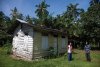 La première maison construite par les rapatriés surinamais à  Tongar en 1954.